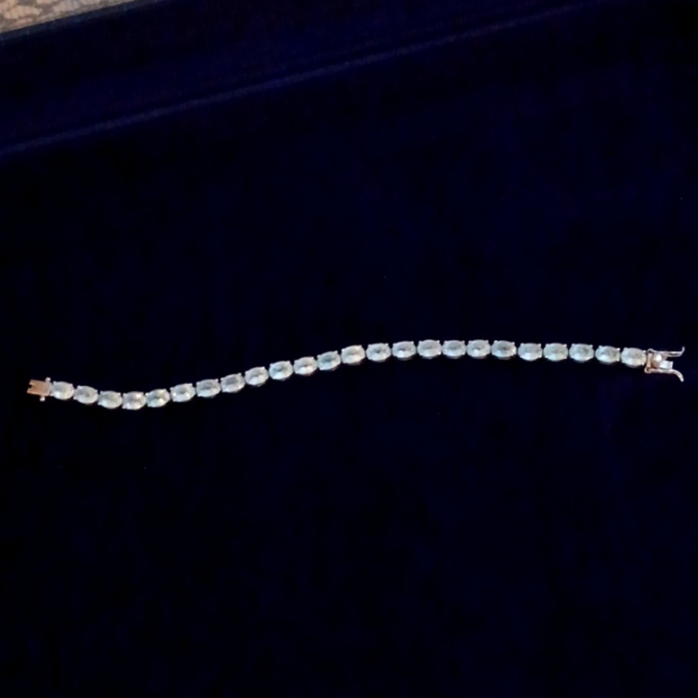 Sky blue topez line bracelet and sterling silver